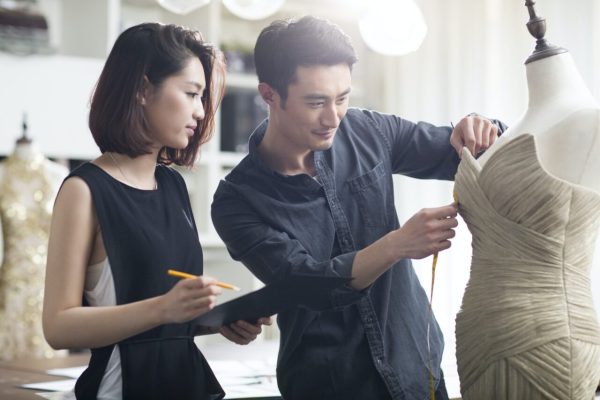 fashion-designers-working-in-studio.jpg showstopper fashion desining course